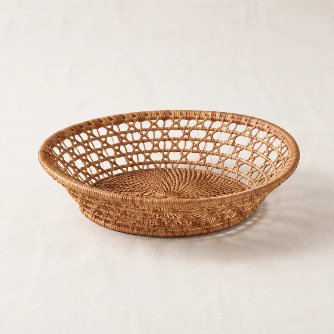 Bread Basket Ø22 — Rattan — Rattan weave, shown empty on a plain background