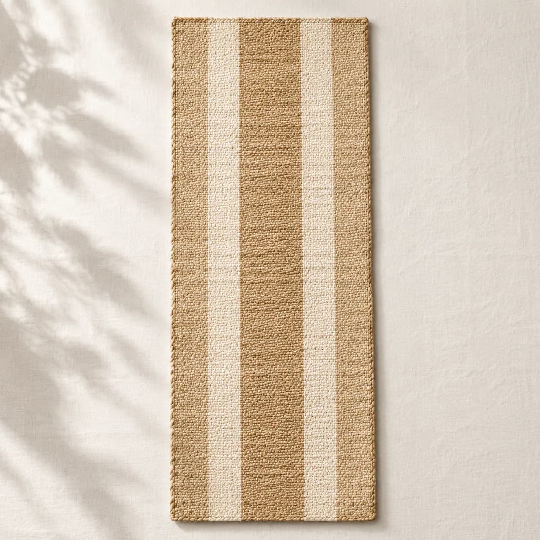 Table Runner Woven 140×35 — Seagrass & Cotton, shown empty on a plain linen-white background