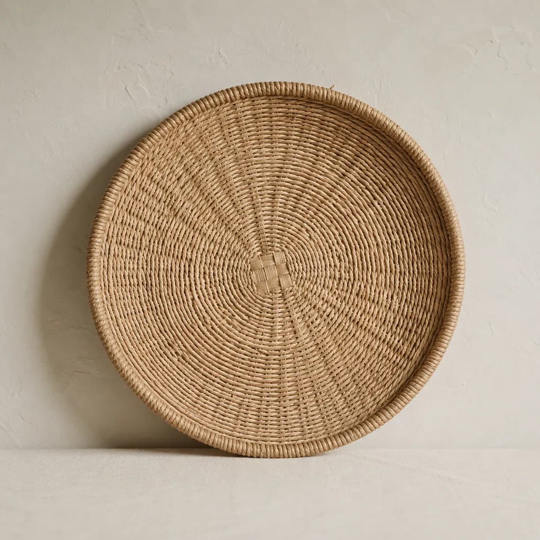 Wall Basket Ø30 — Seagrass, shown empty on a plain linen-white background