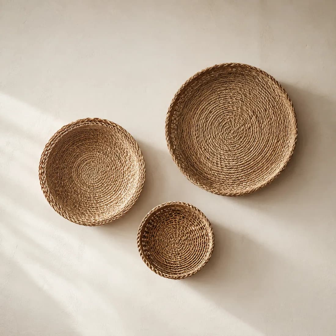 Wall Basket Trio — Seagrass — Seagrass weave, shown empty on a plain background